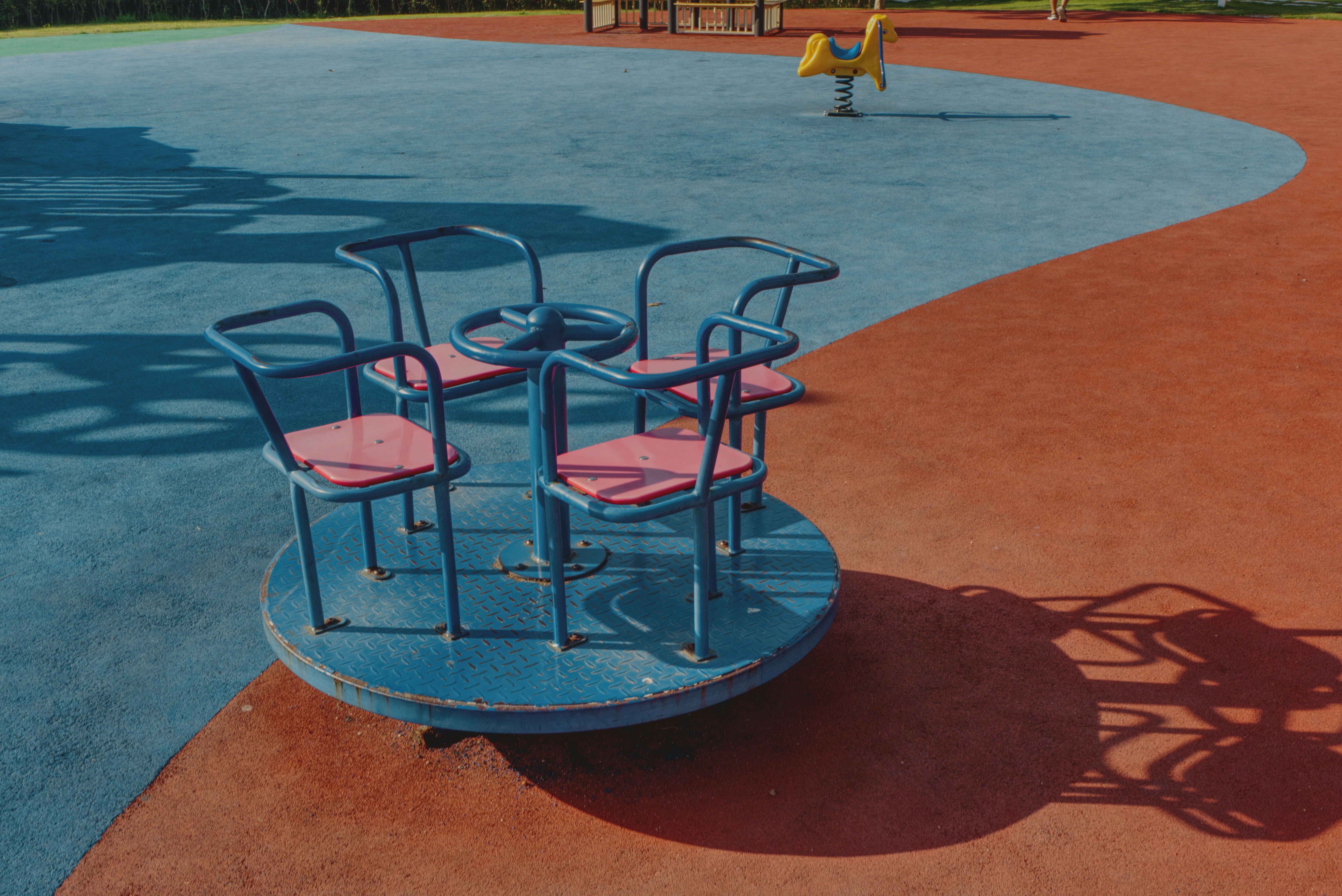 An empty playground merry-go-round
